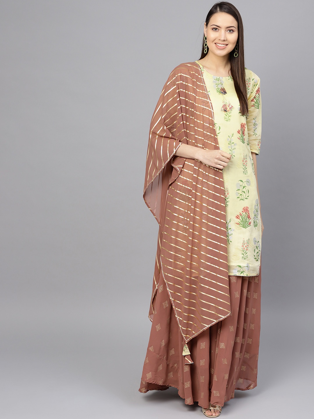 

Ahalyaa Women Yellow & Brown Printed Kurta with Skirt & Dupatta