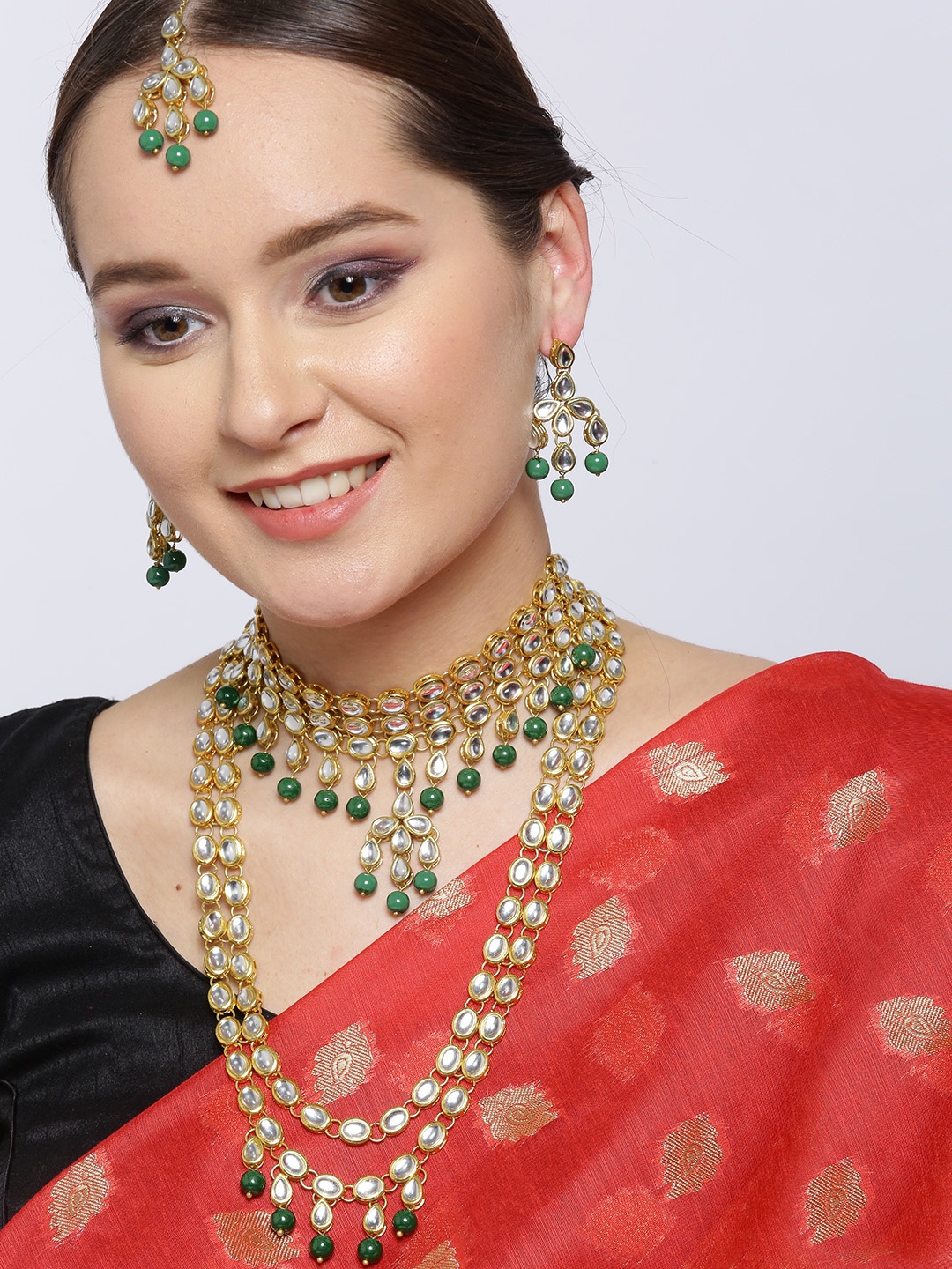 

Karatcart Green Gold-Plated Kundan-Studded & Beaded Handcrafted Jewellery Set