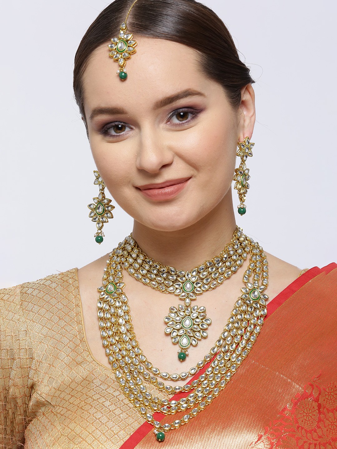 

KARATCART Green Gold-Plated Kundan Studded & Beaded Handcrafted Jewellery Set