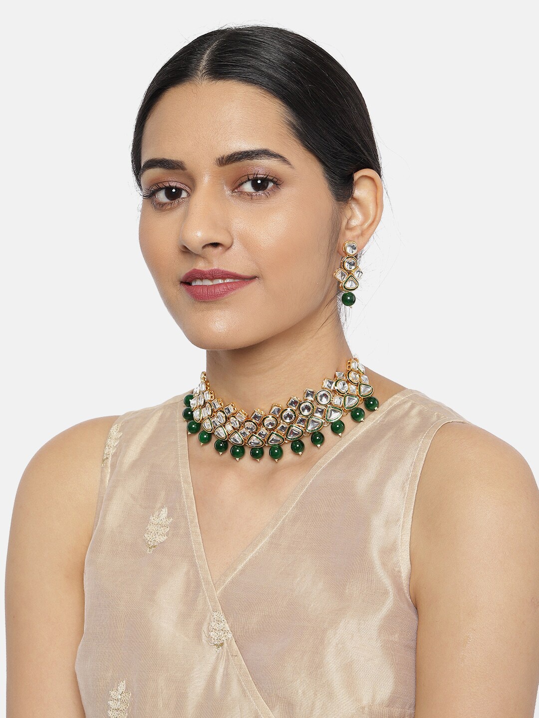 

Zaveri Pearls Gold-Toned & Green Beads & Kundan Studded Choker Jewellery Set