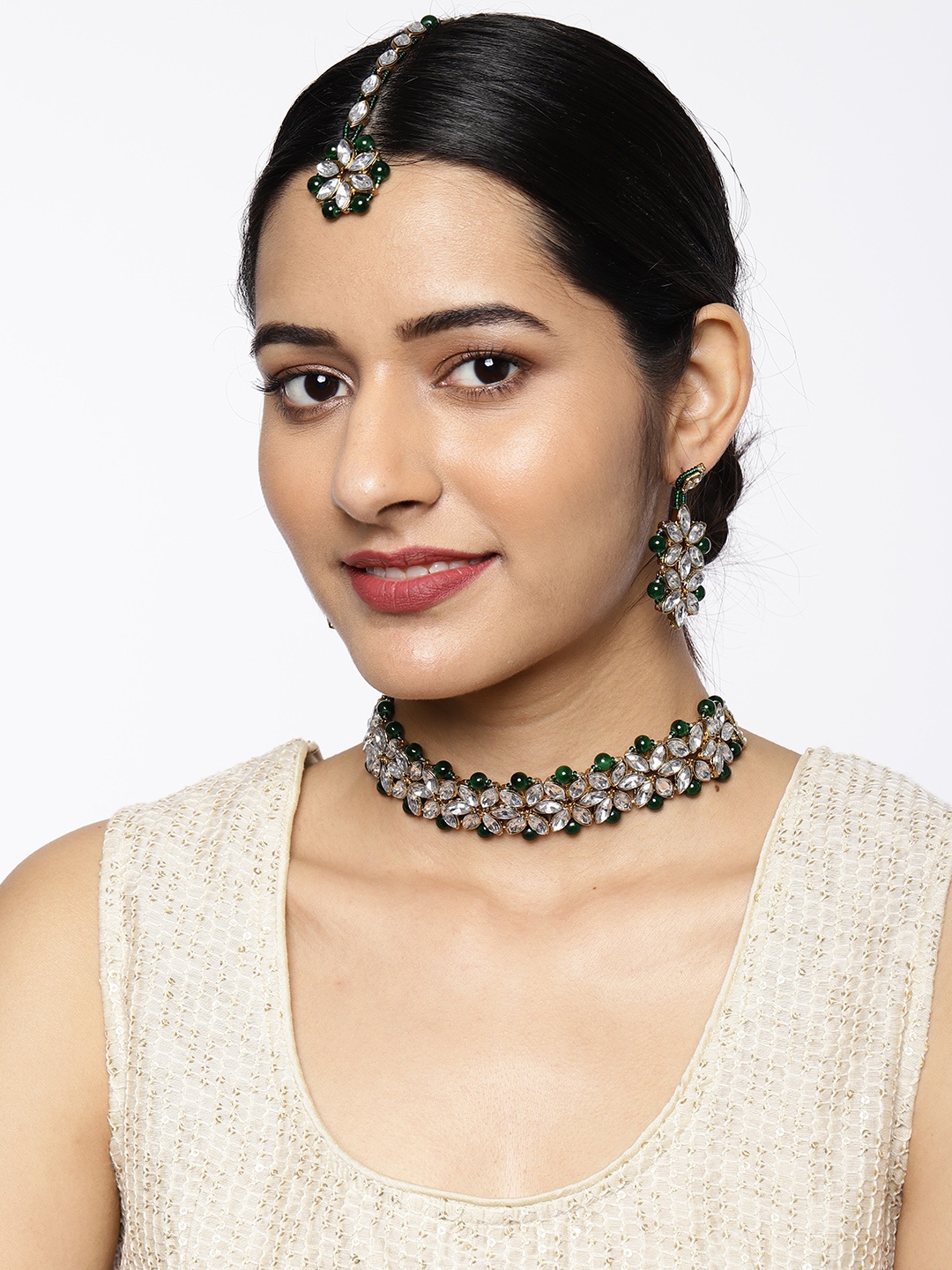 

Zaveri Pearls Gold-Plated Green Embellished Jewellery Set