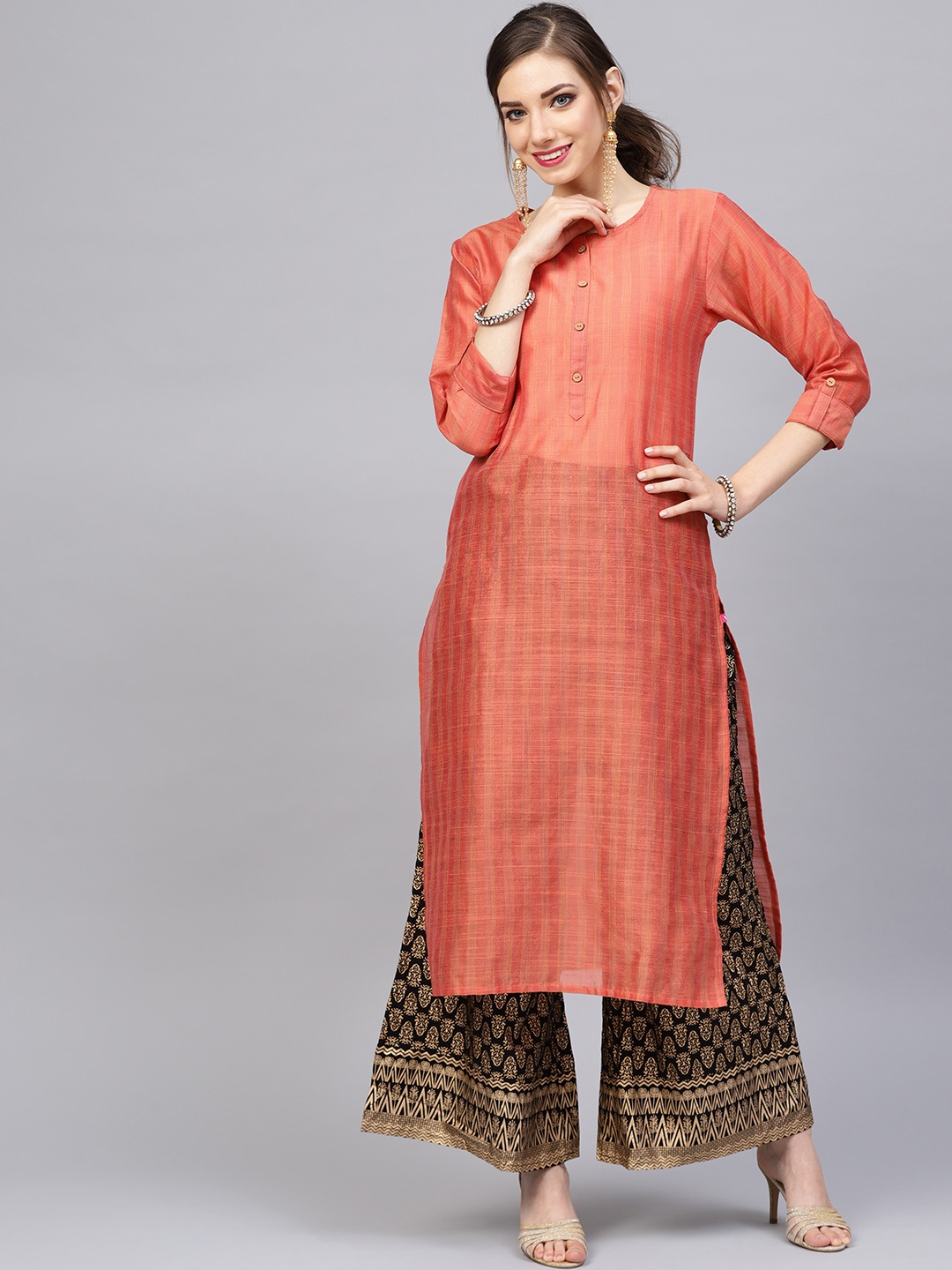 

Varanga Women Rust Orange & Black Self-Striped Handloom Kurta with Palazzos