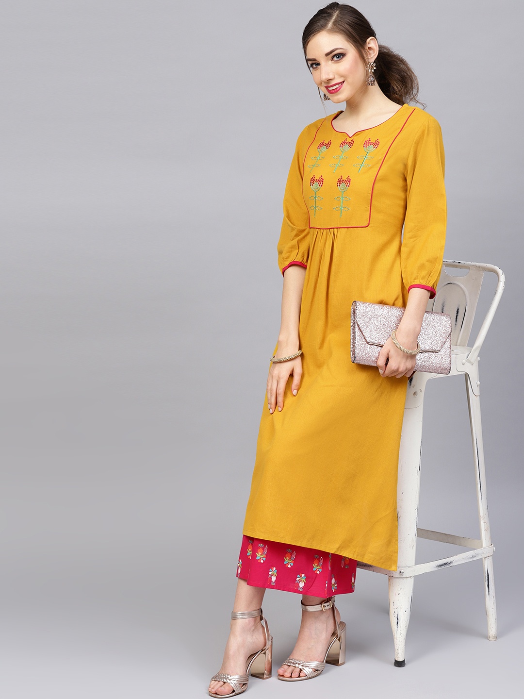 

Varanga Women Mustard Yellow & Magenta Yoke Design Kurta with Palazzos