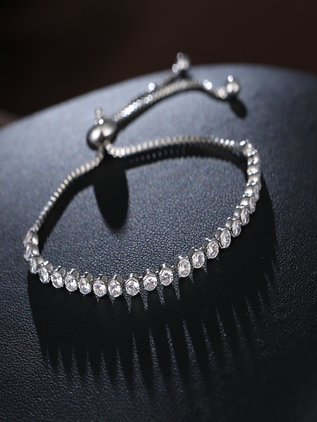 

OOMPH Women Brass Silver-Plated Handcrafted Cubic Zirconia Link Bracelet