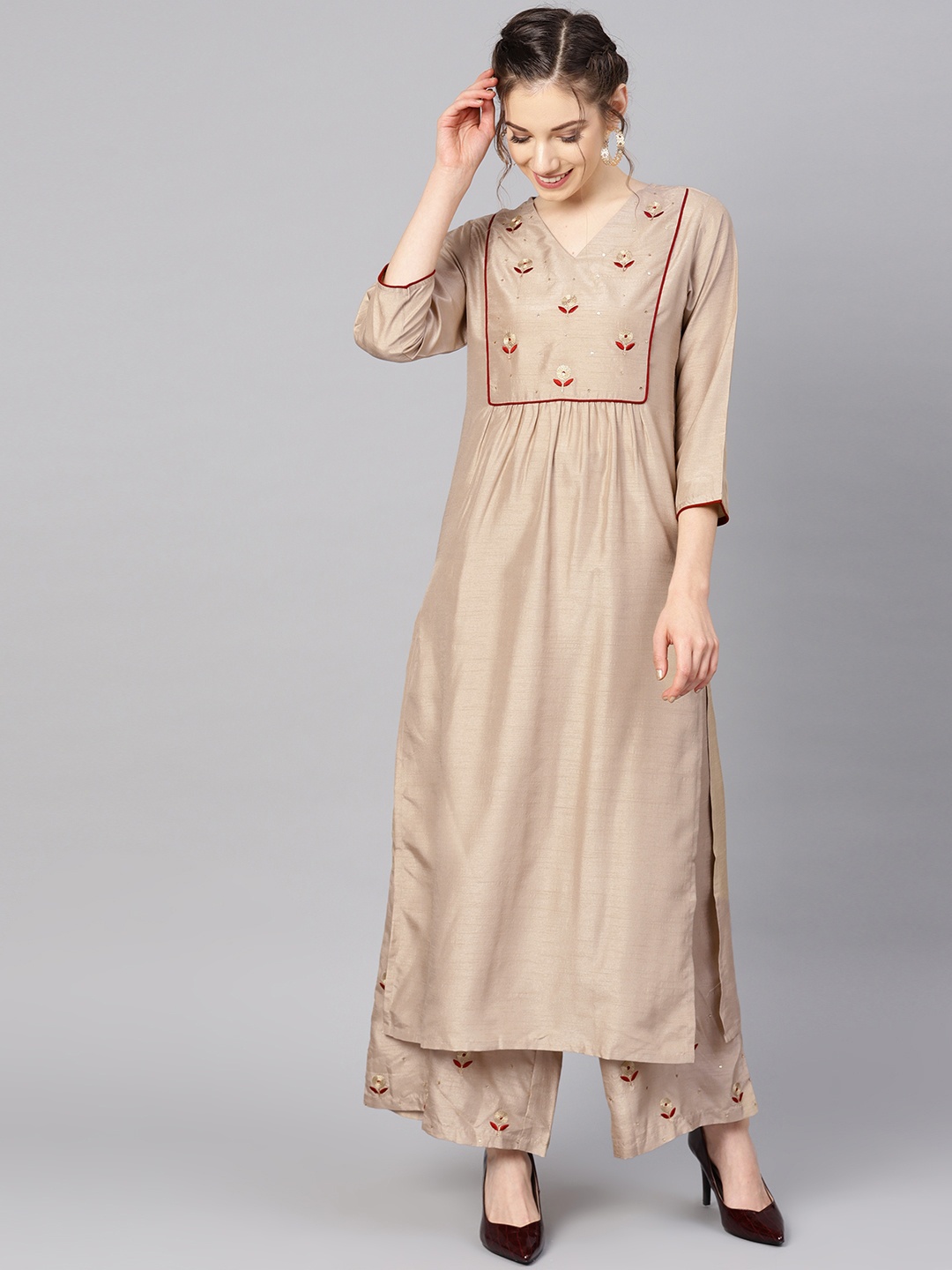 

Varanga Women Beige Yoke Design Kurta with Palazzos
