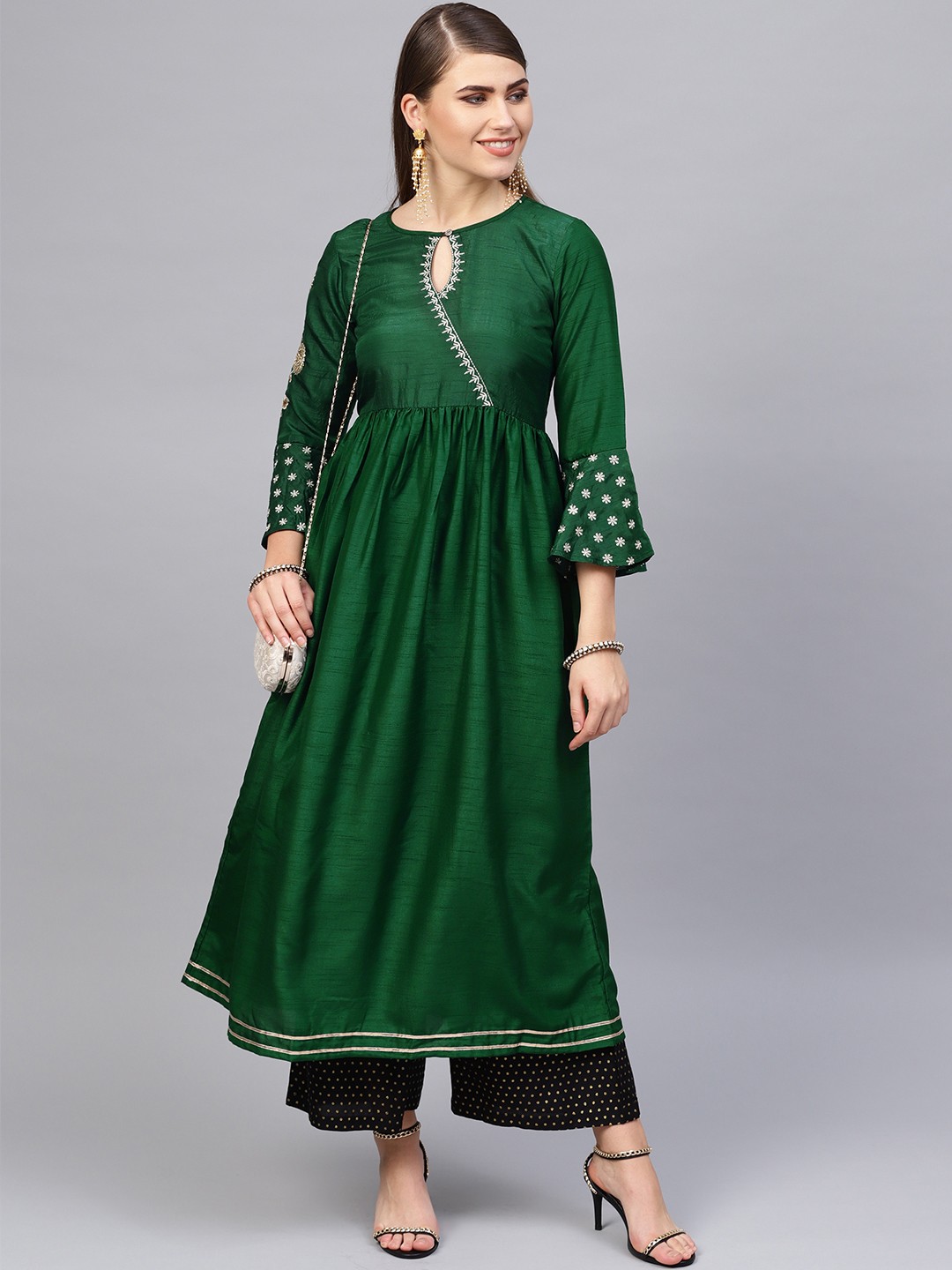 

Varanga Women Green & Golden Solid A-Line Kurta