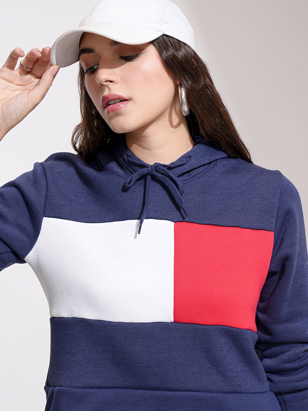 

Tokyo Talkies Women Navy Blue & Red Colourblocked Hooded Sweatshirt