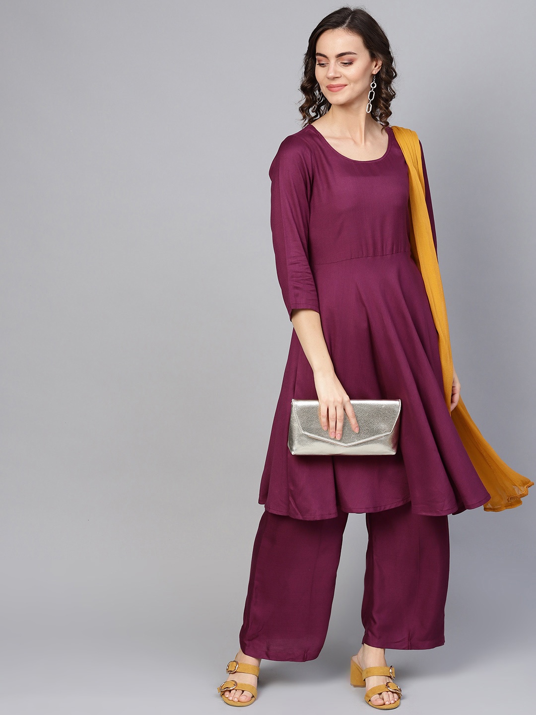 

Jompers Women Burgundy Solid Kurta with Palazzos & Dupatta