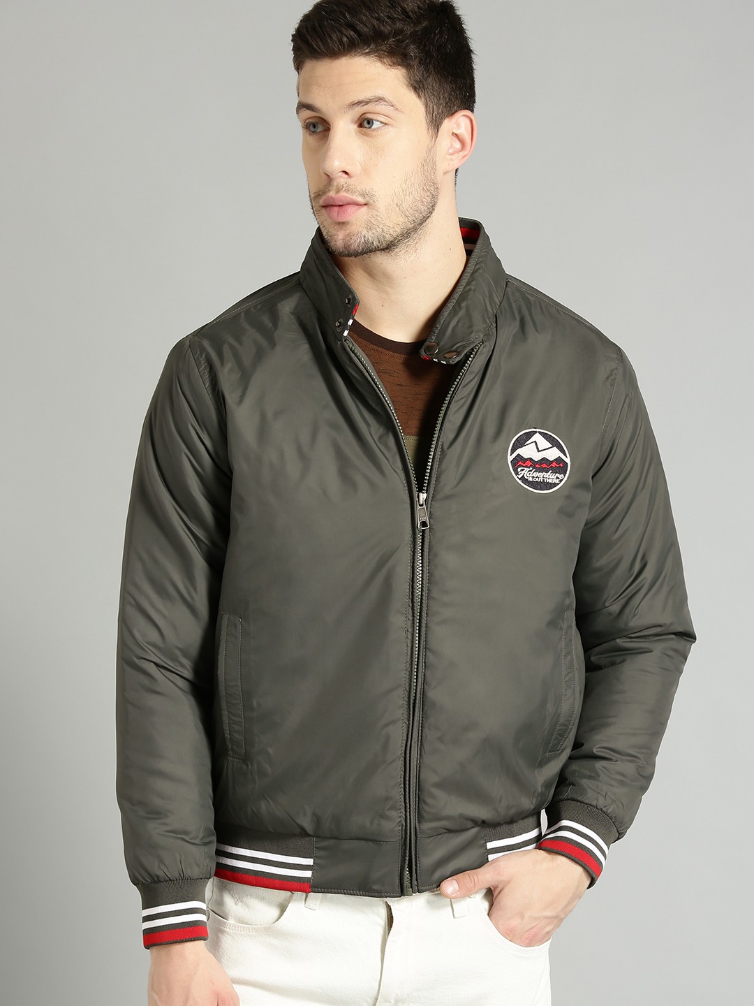 

The Roadster Lifestyle Co Men Olive Green Solid Varsity Jacket