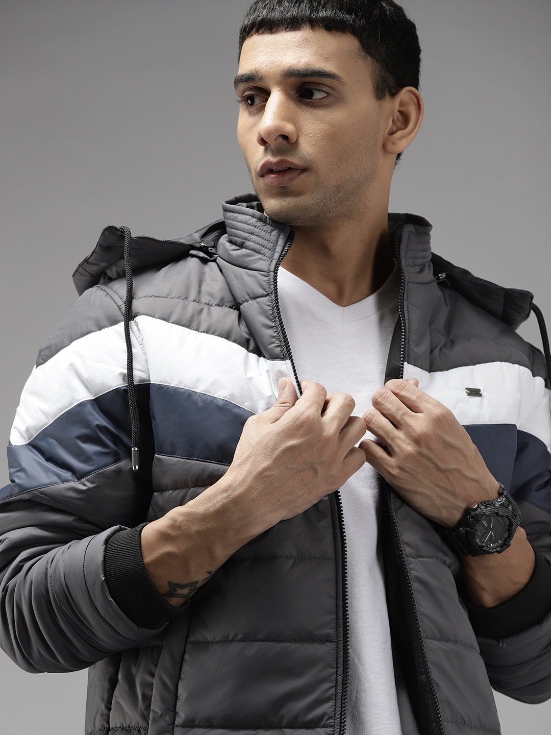

Roadster Men Charcoal Grey & White Striped Padded Jacket