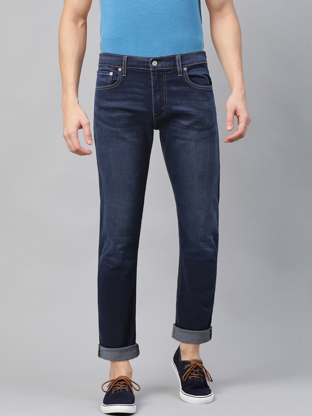

Levis Men Navy Blue Tapered Fit Mid-Rise Clean Look Stretchable Jeans 512