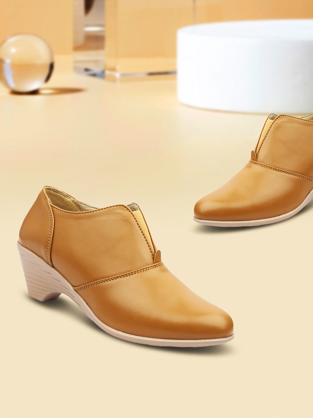 

VALIOSAA Women Beige Solid Heeled Boots