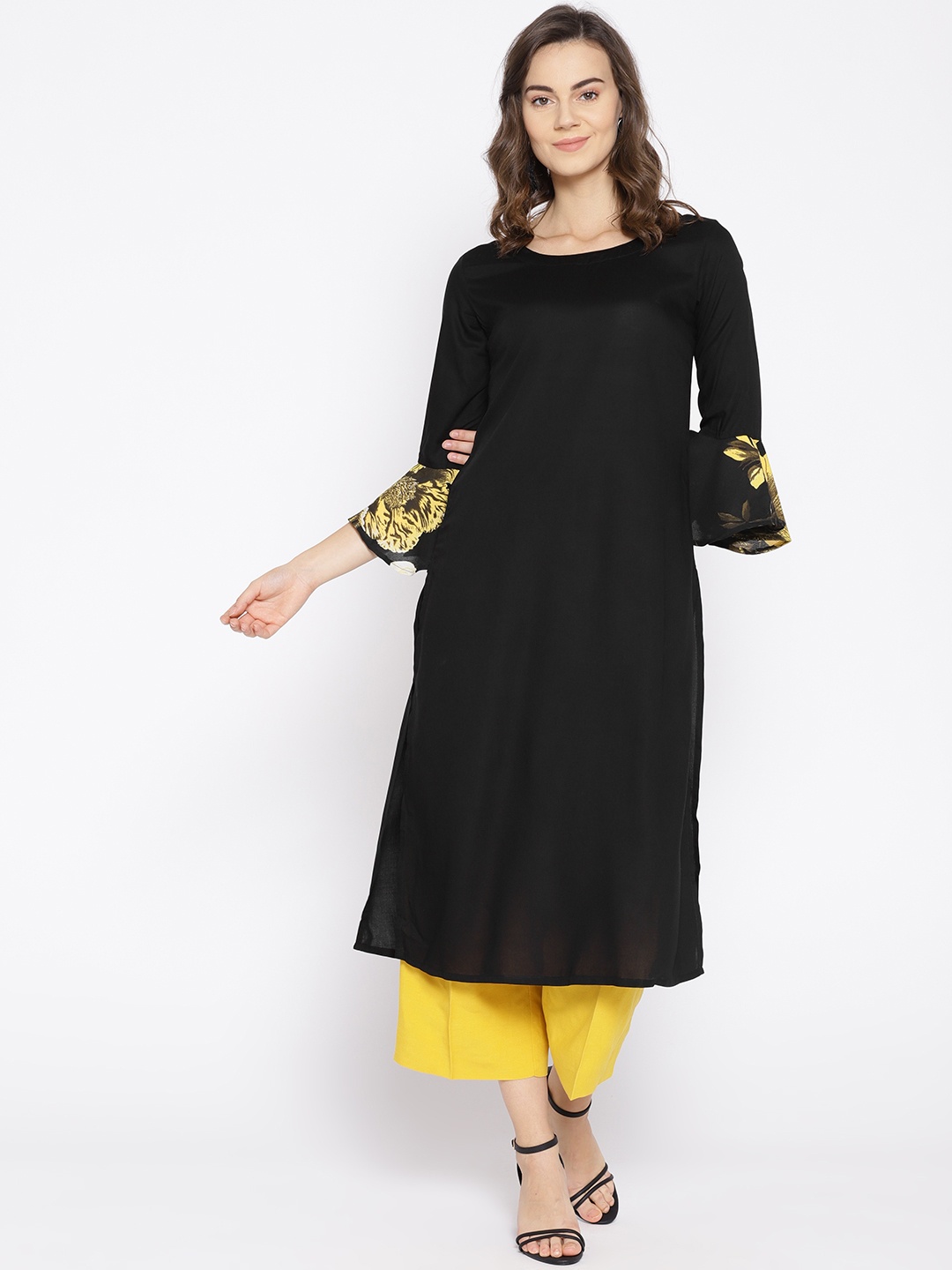 

Raano Women Black Solid Straight Kurta