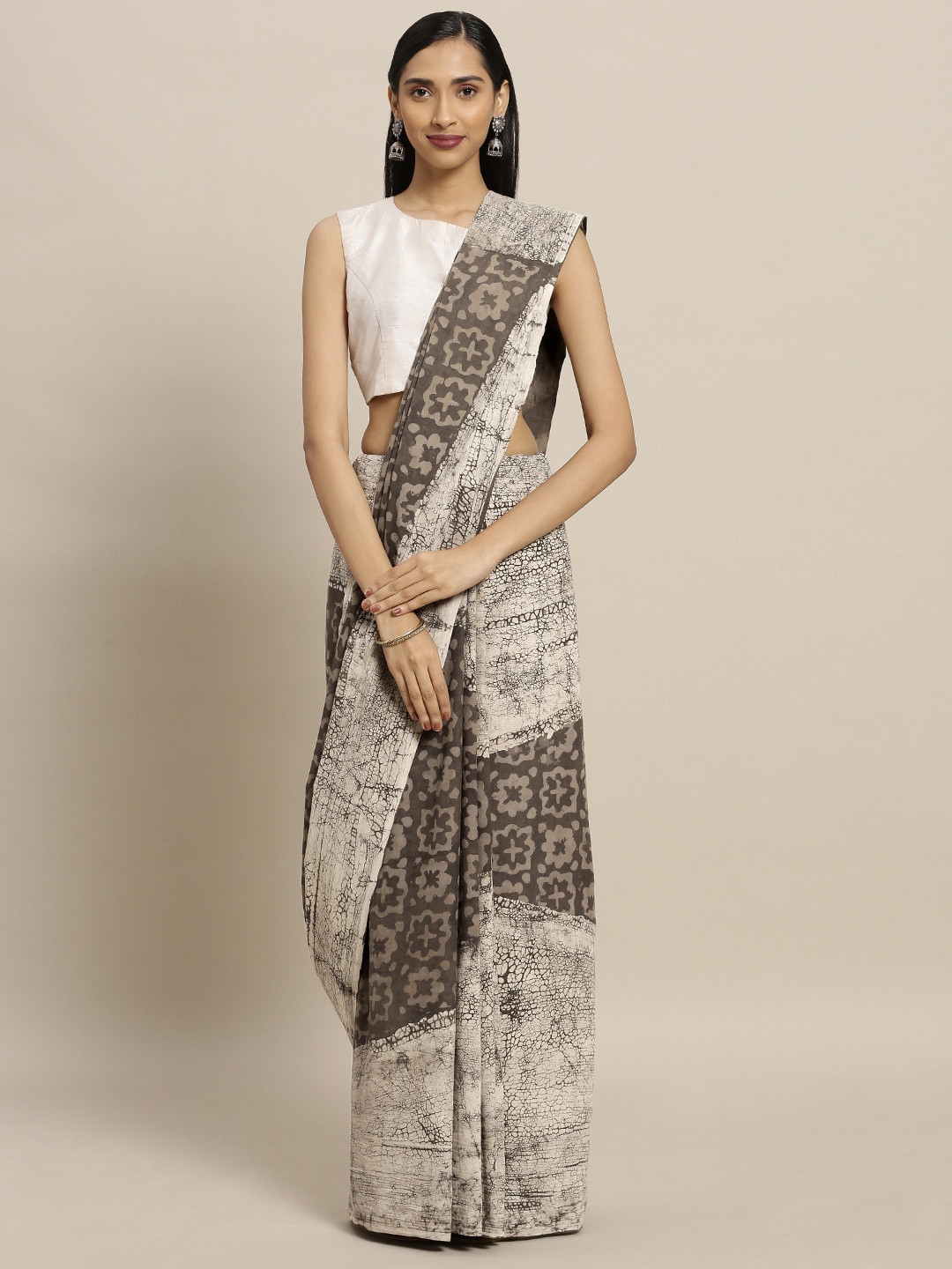 

Mitera Brown & Beige Pure Cotton Dyed Dabu Saree