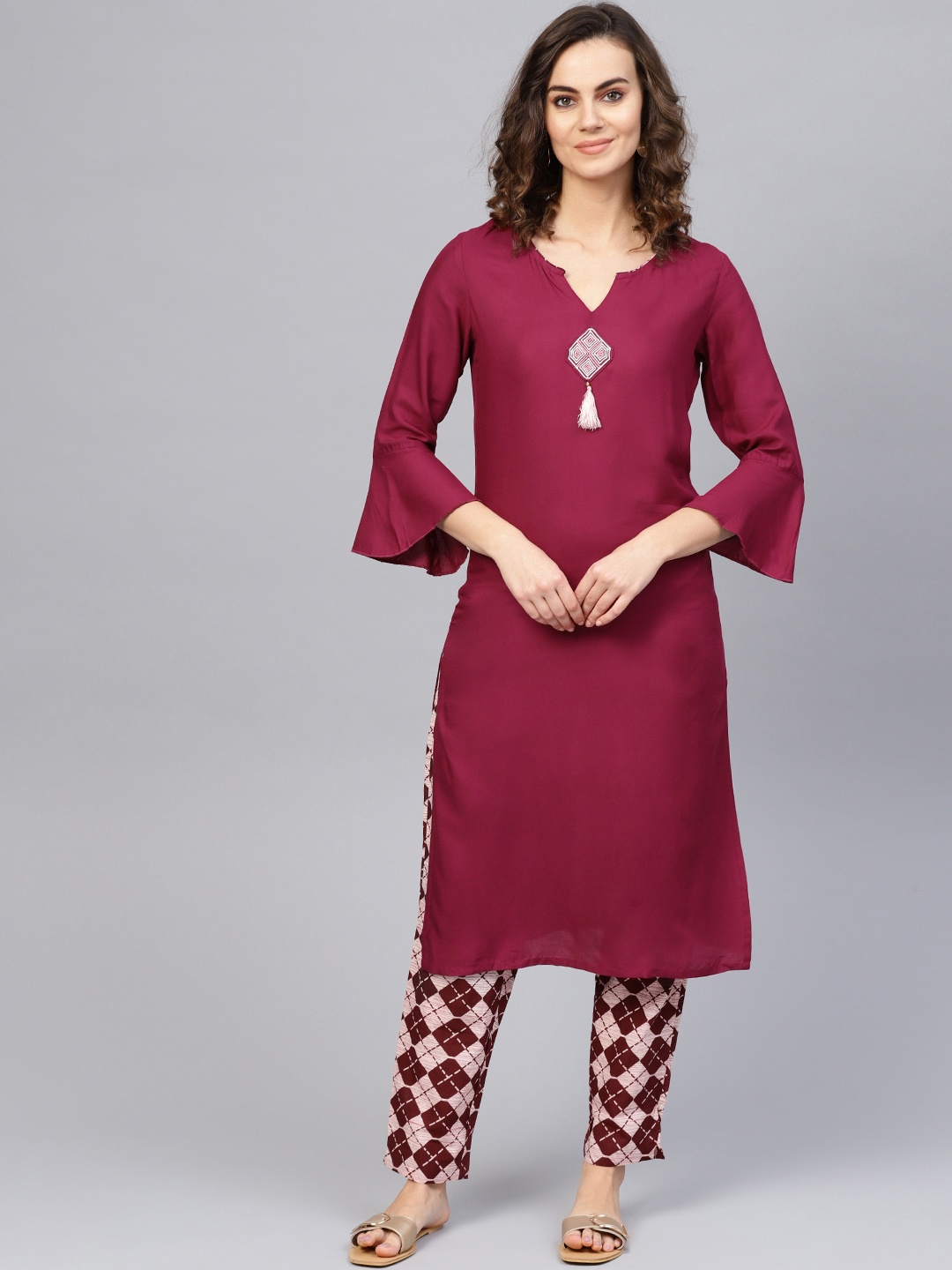 

Yufta Women Burgundy & Off-White Solid Kurta with Trousers