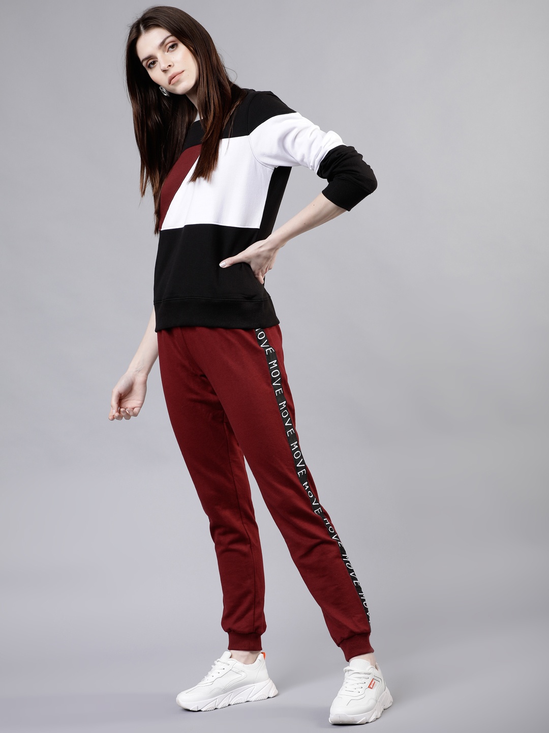 

Tokyo Talkies Women Black & Maroon Colourblocked Sweatshirt