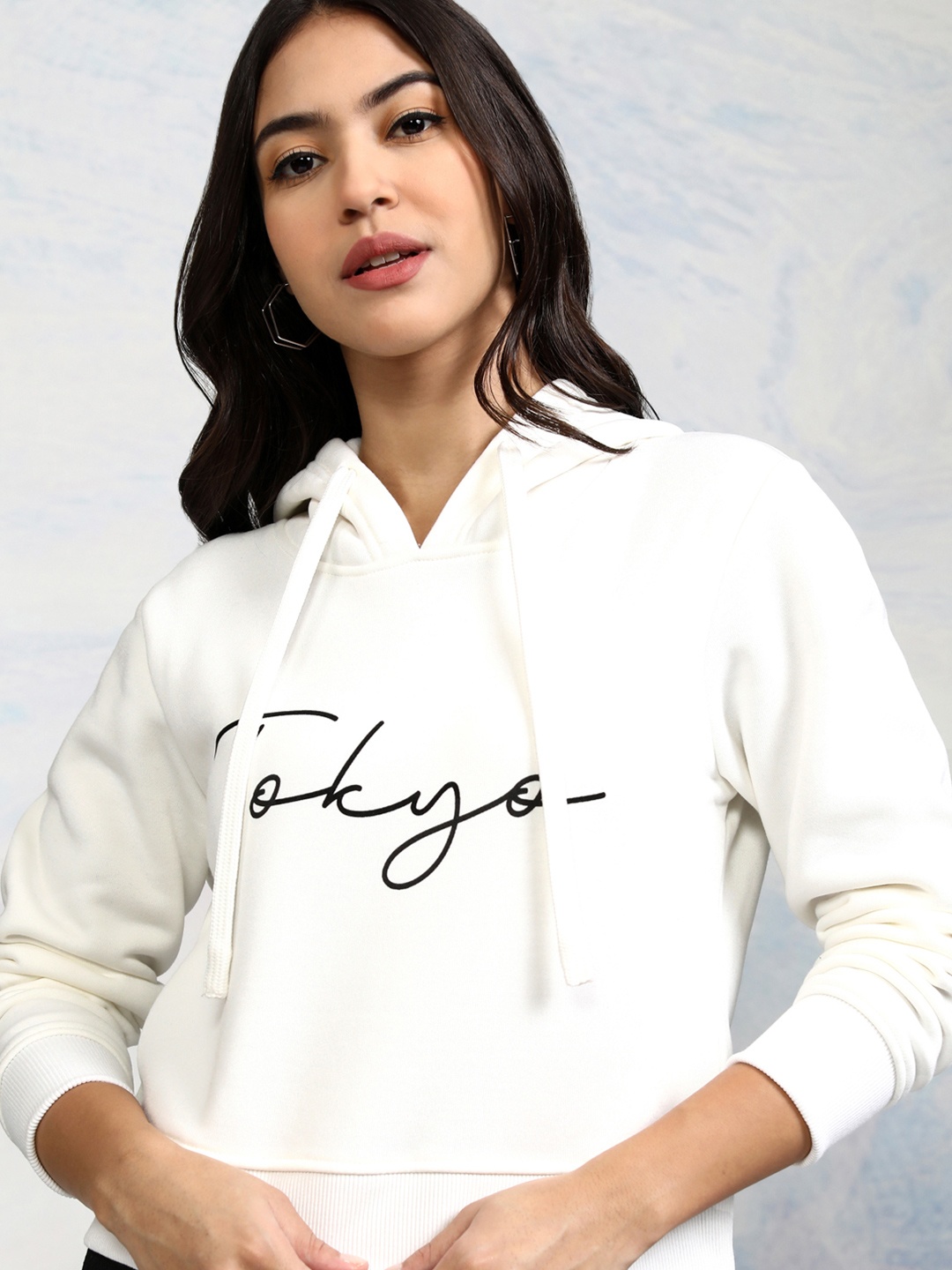 

Tokyo Talkies Women White & Black Printed Hooded Sweatshirt