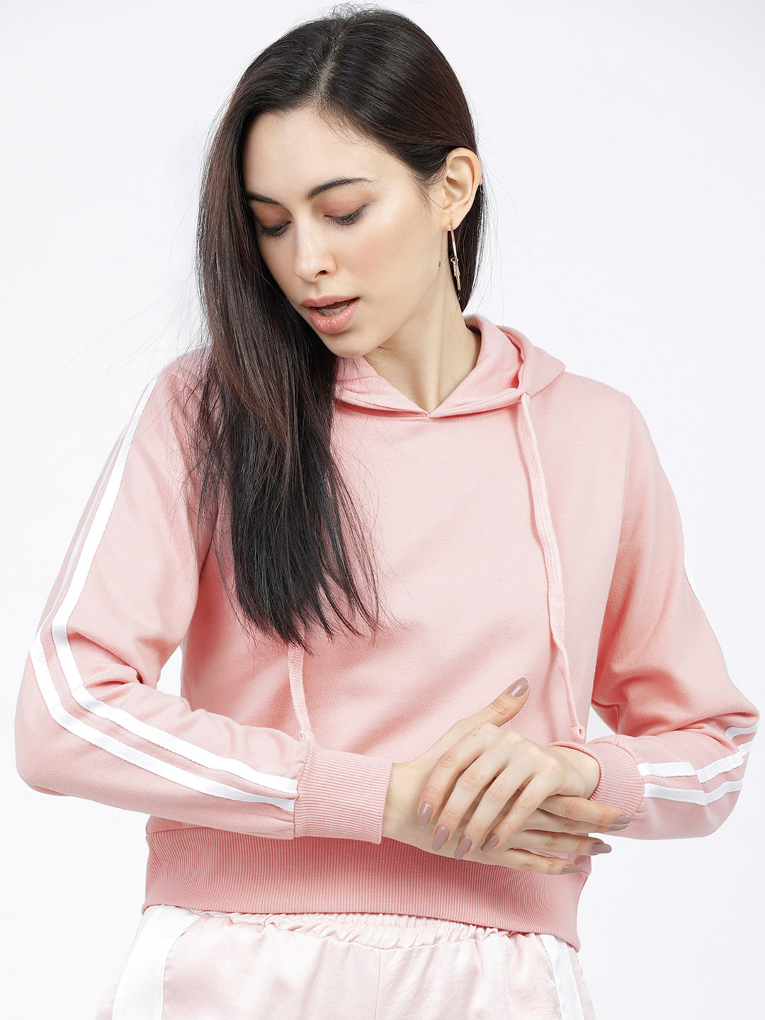 

Tokyo Talkies Women Pink & White Solid Hooded Sweatshirt
