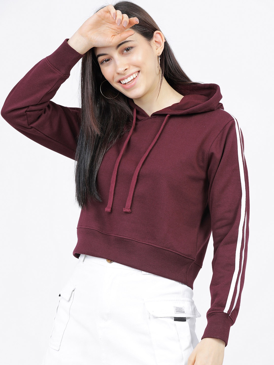 

Tokyo Talkies Women Burgundy & White Solid Hooded Sweatshirt