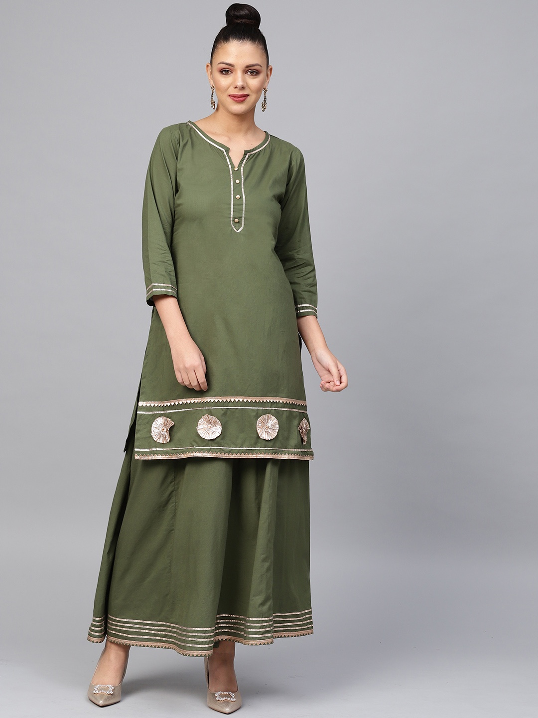 

Bhama Couture Women Green Solid Kurta with Skirt
