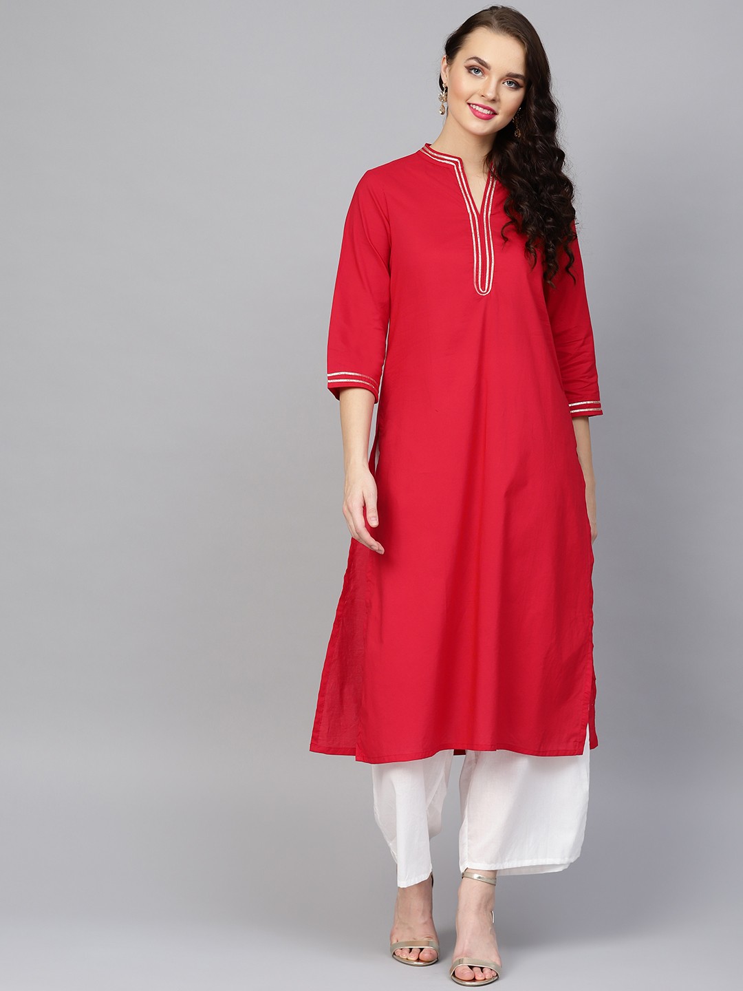 

Bhama Couture Women Red & White Solid Kurta with Palazzos