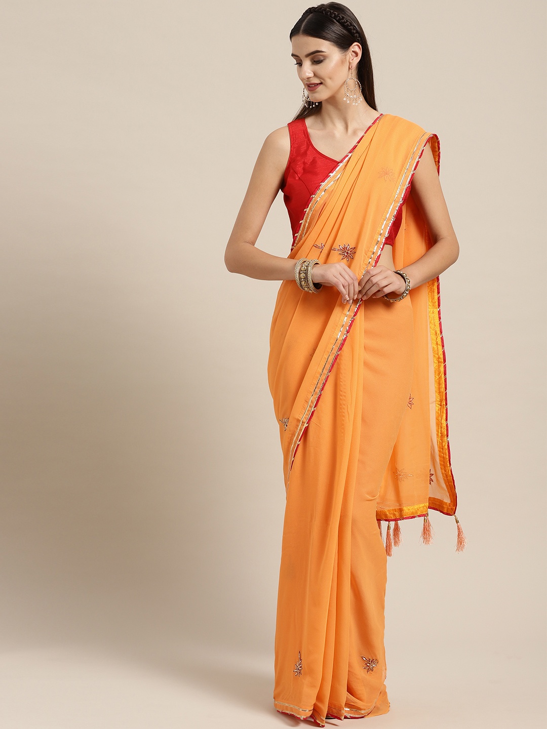 

Geroo Jaipur Orange Hand Embroidered Georgette Sustainable Saree