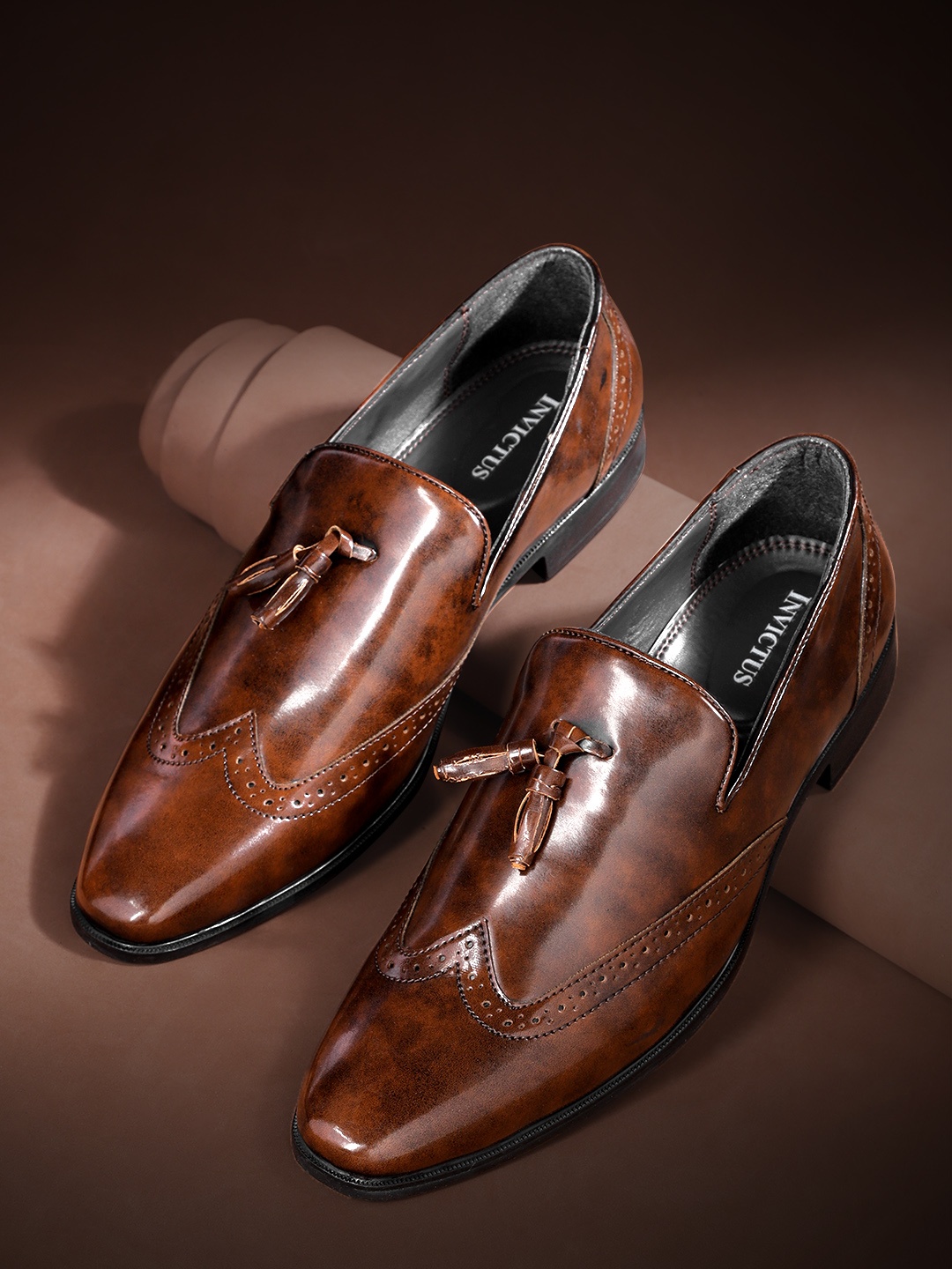 

INVICTUS Men Brown Solid Tasselled Semiformal Slip-Ons