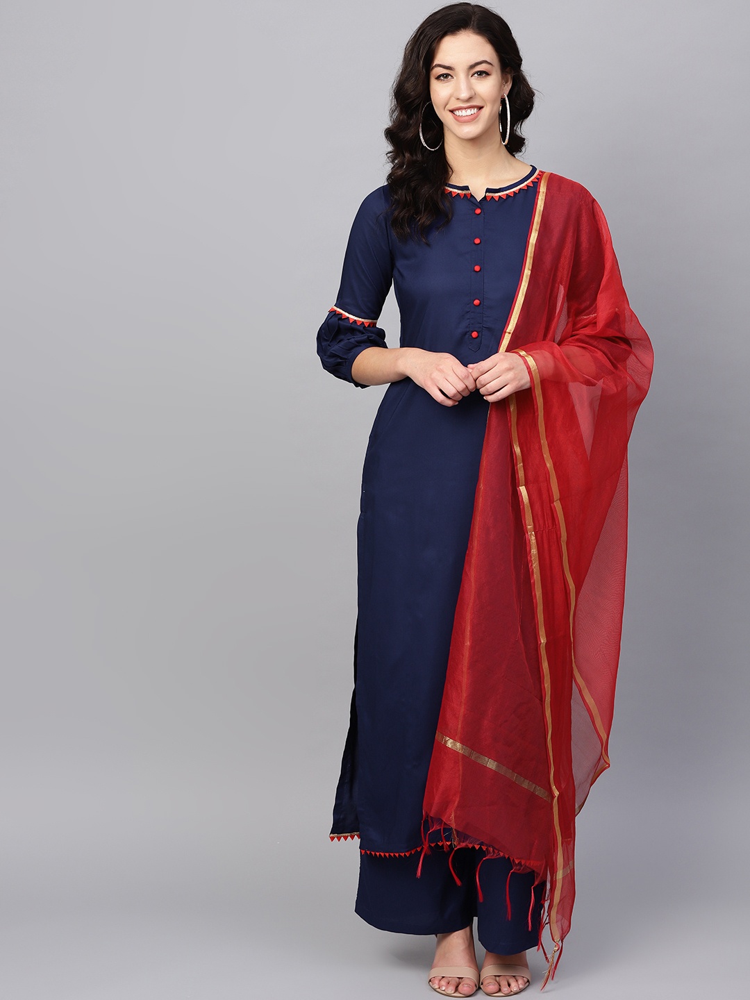 

Tulsattva Women Navy Blue Solid Kurta with Palazzos & Dupatta