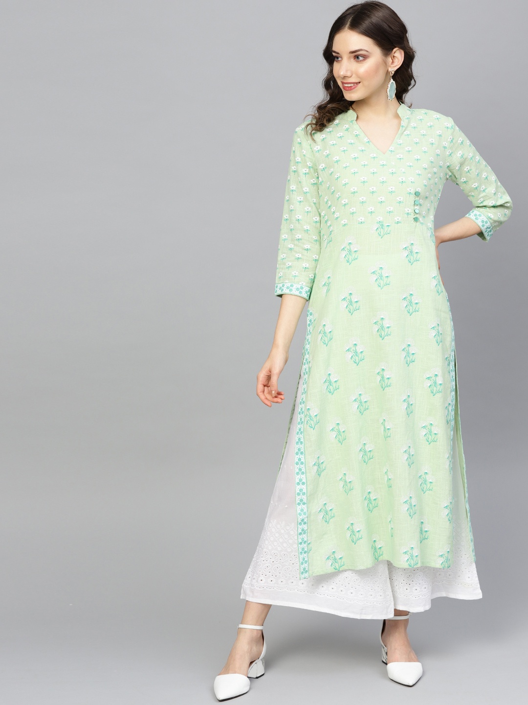 

Yuris Women Green & White Printed Straight Kurta