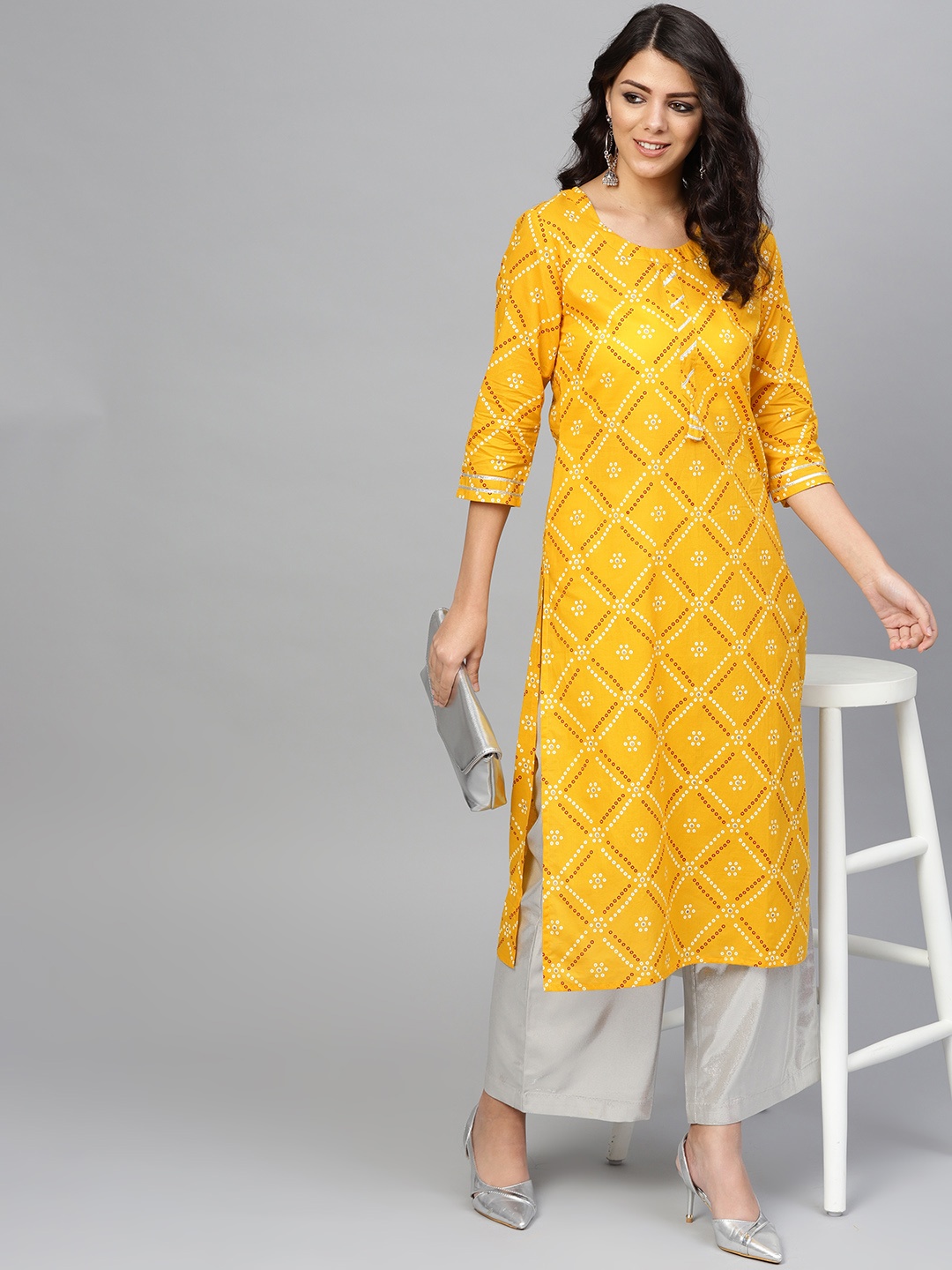 

Yuris Women Yellow & Red Bandhani Print Straight Kurta