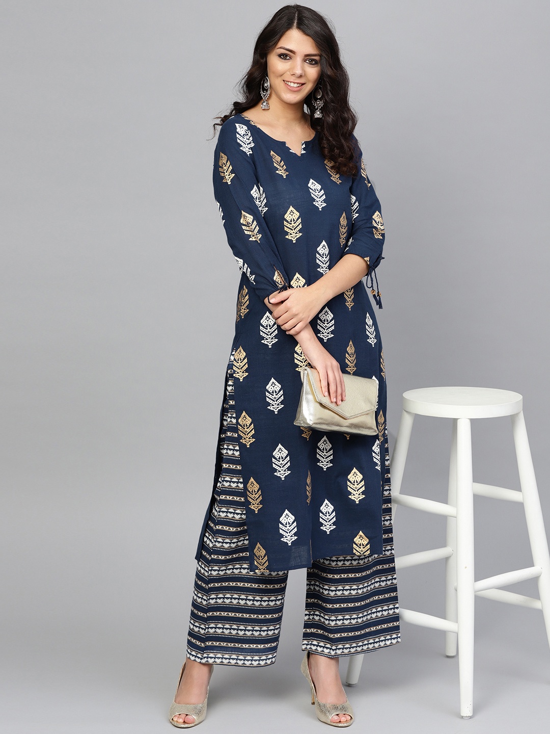 

Yuris Women Navy Blue & Golden Printed Kurta with Palazzos