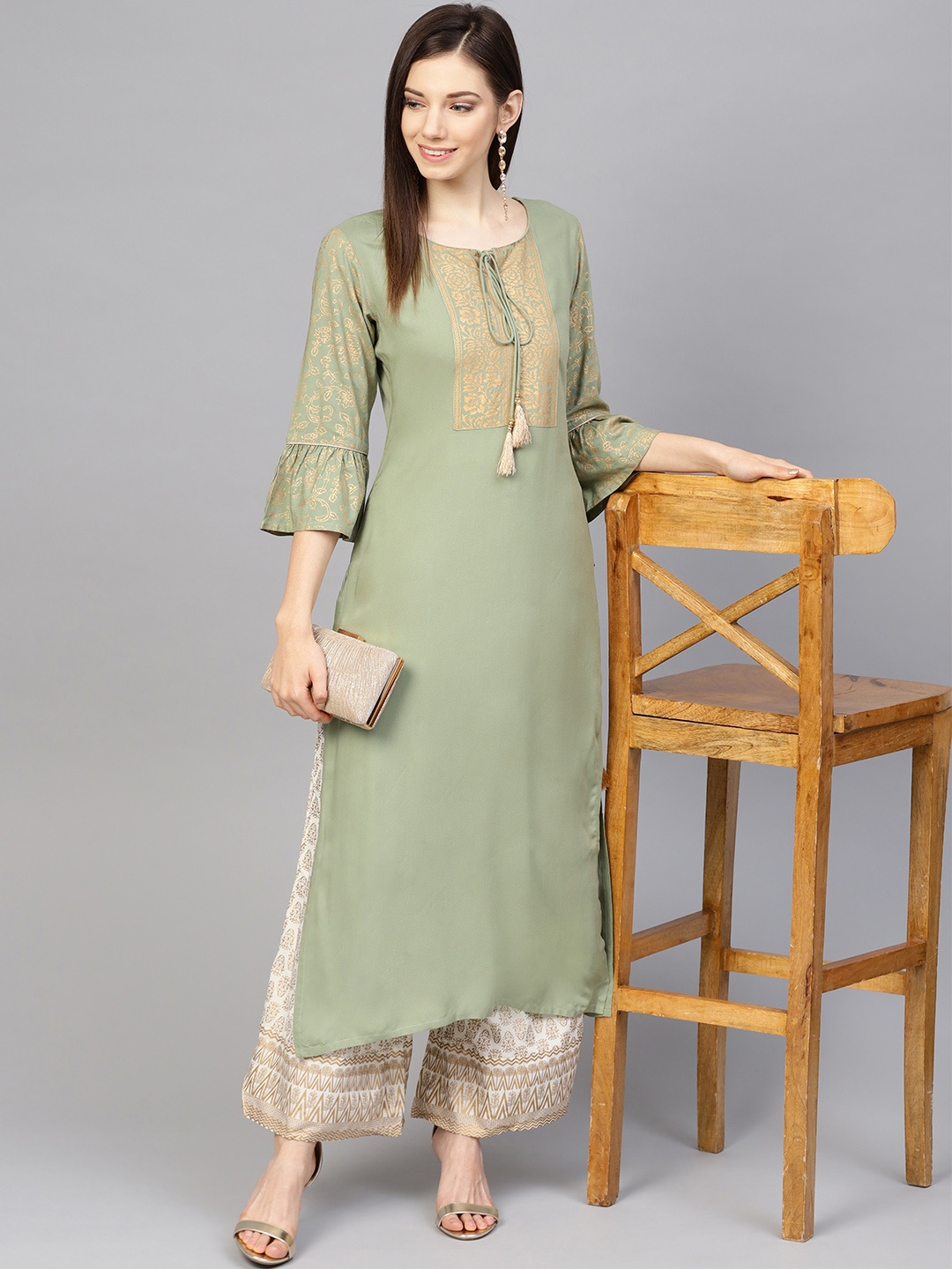 

Varanga Women Green & Off-White Yoke Design Foil Print Kurta with Palazzos