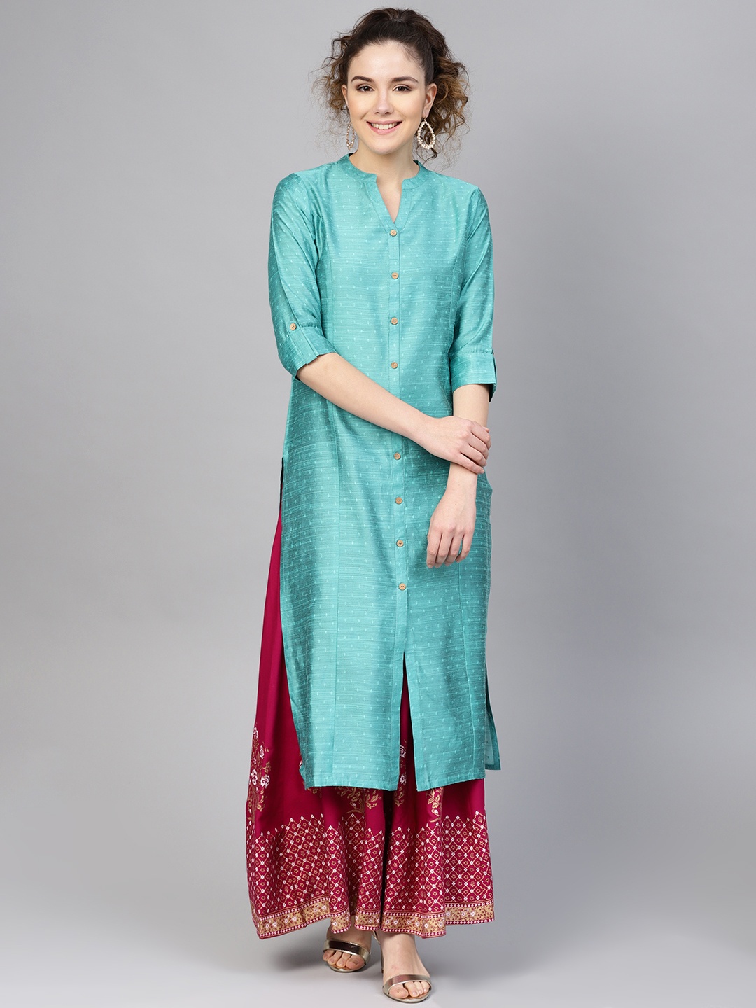 

Varanga Women Sea Green & Magenta Solid Kurta with Skirt