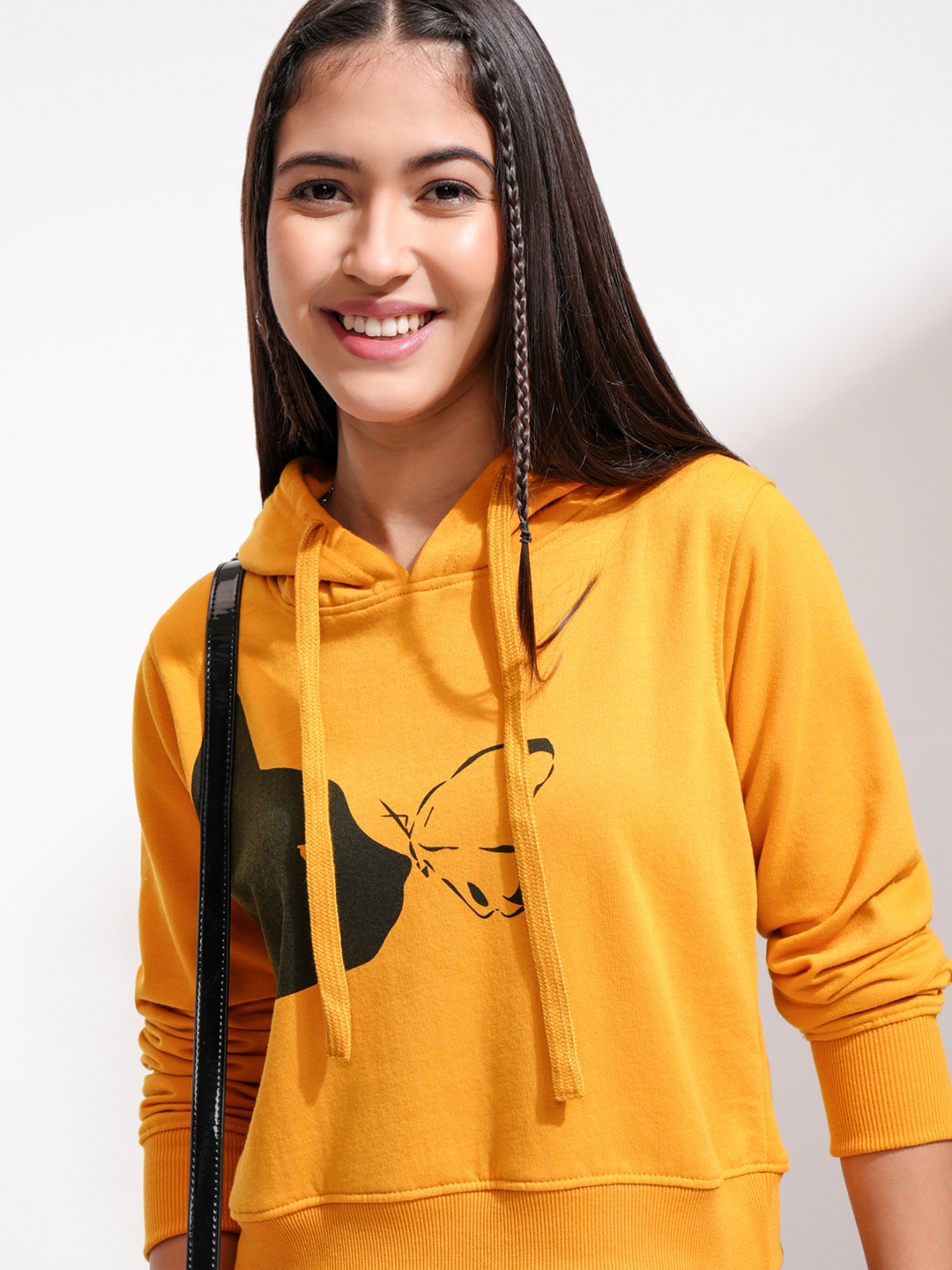 

Tokyo Talkies Women Mustard Orange Solid Hooded Sweatshirt