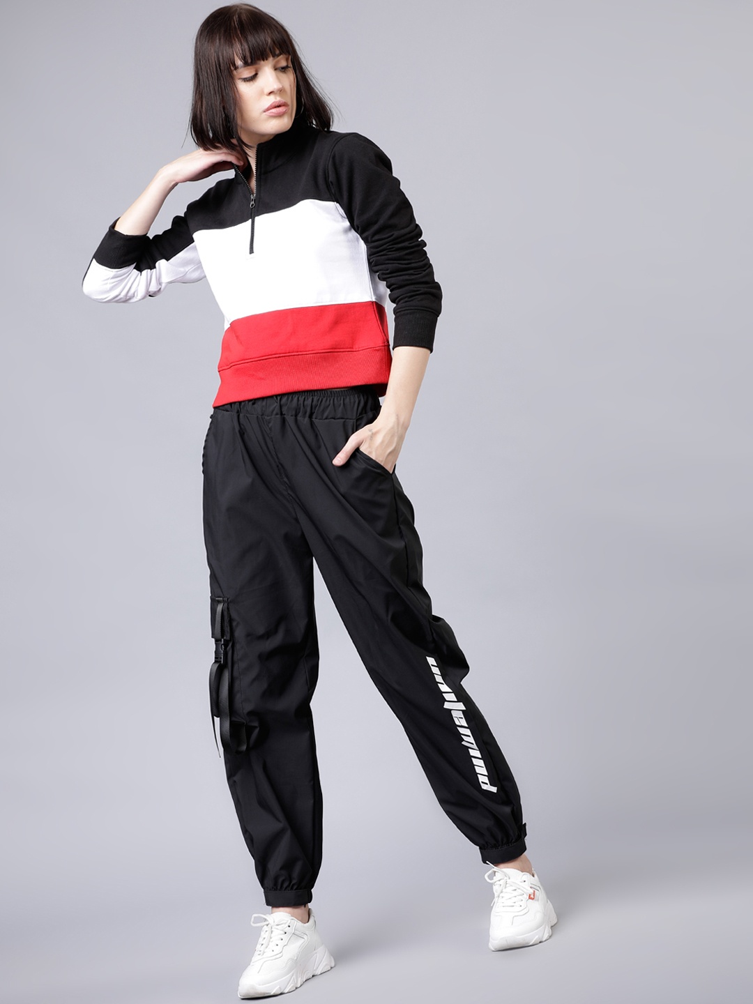

Tokyo Talkies Women Black & Red Colourblocked Sweatshirt