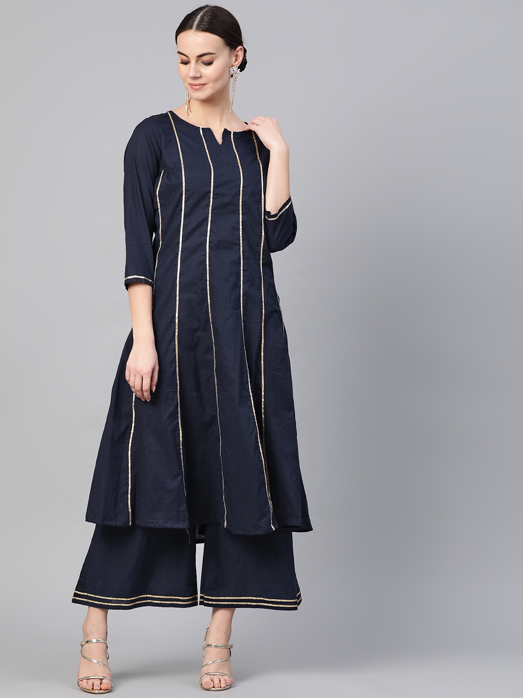 

Bhama Couture Women Navy Blue Gotta Patti Striped Kurta with Palazzos