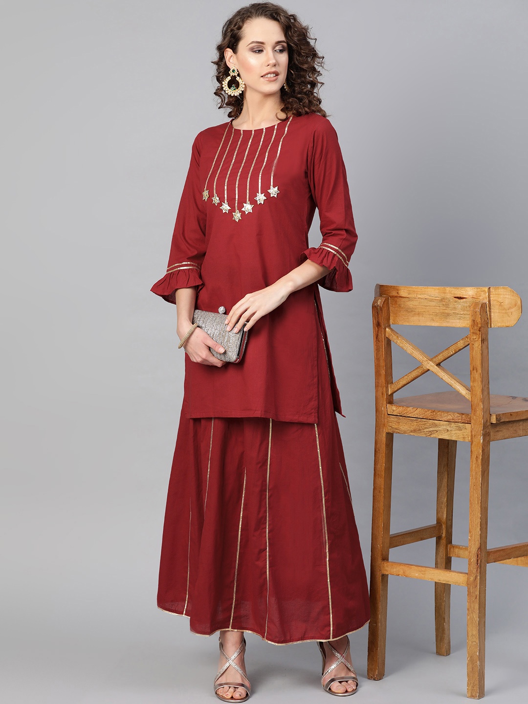 

Bhama Couture Women Maroon & Golden Gotta Patti Detail Kurta with Skirt