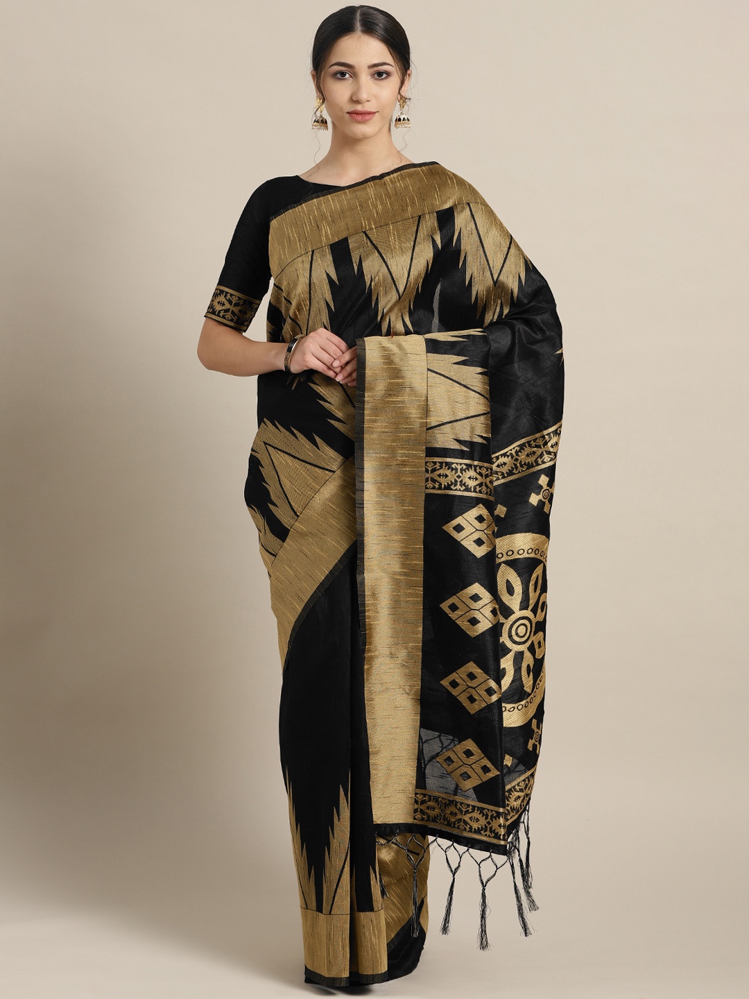 

Saree mall Black & Beige Solid Saree