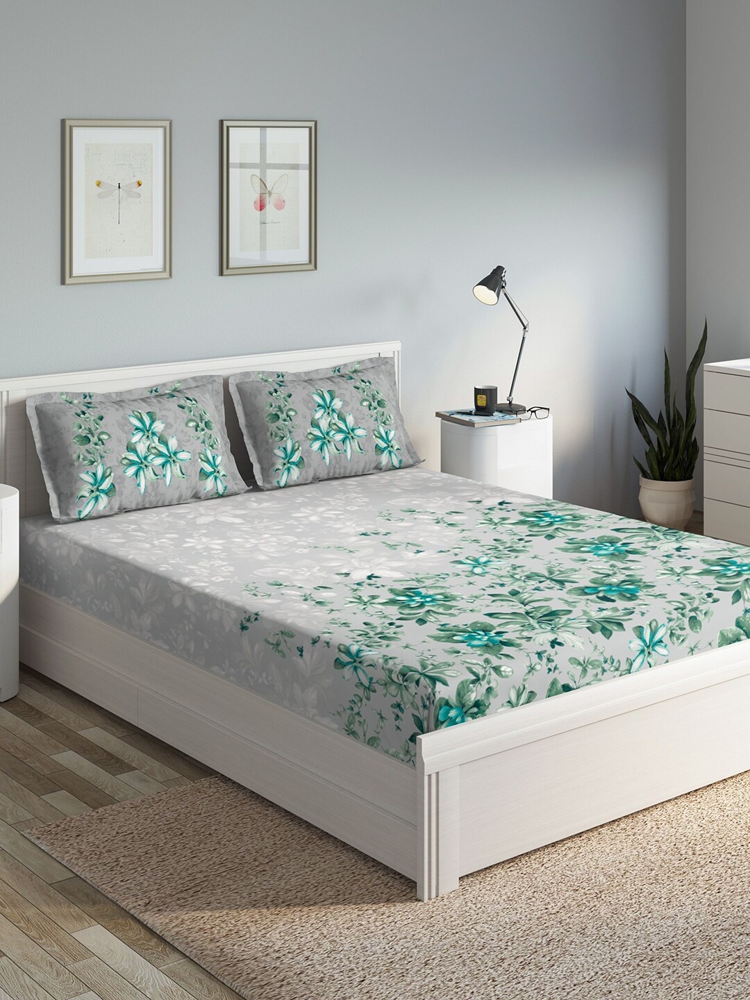 

DDecor Turquoise Blue Floral 140 TC Cotton 1 Queen Bedsheet with 2 Pillow Covers