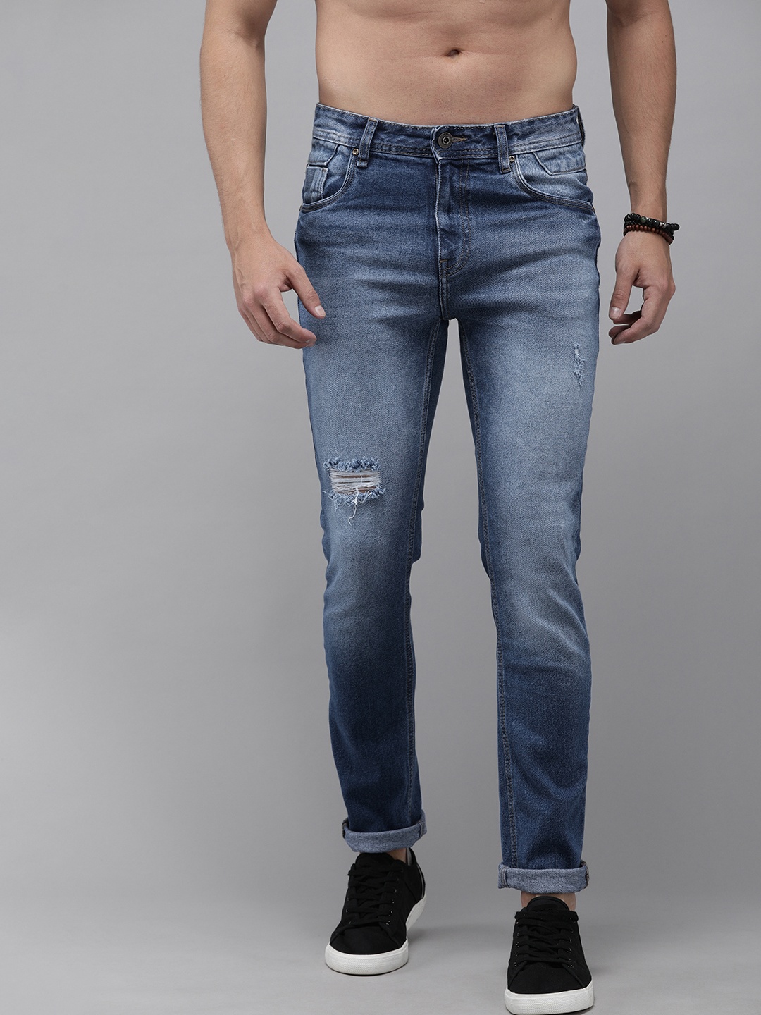 

The Roadster Lifestyle Co Men Blue Slim Tapered Fit Mid-Rise Mildly Distressed Stretchable Jeans