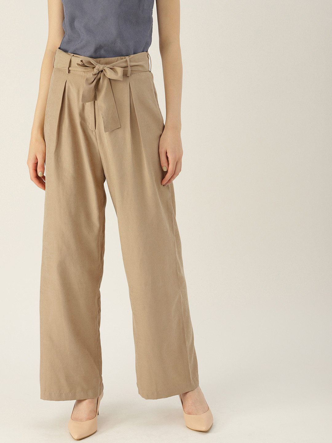 

NUSH Women Beige Flared Solid Parallel Trousers
