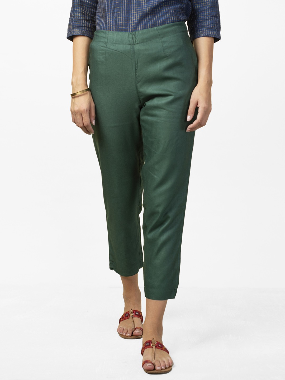 

Fabindia Women Green Slim Fit Solid Cropped Trousers
