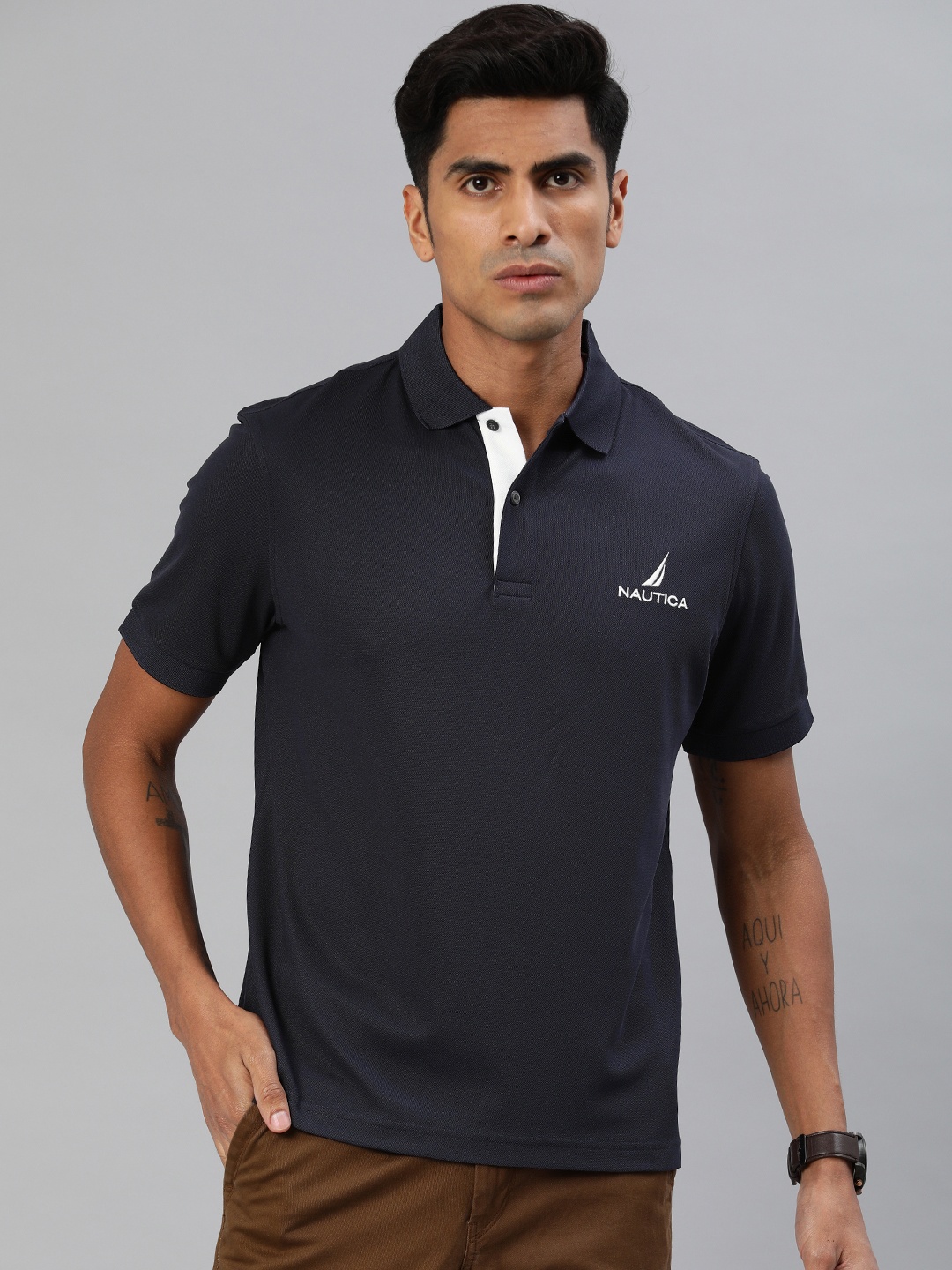 

Nautica Men Navy Blue Solid Polo Collar T-shirt