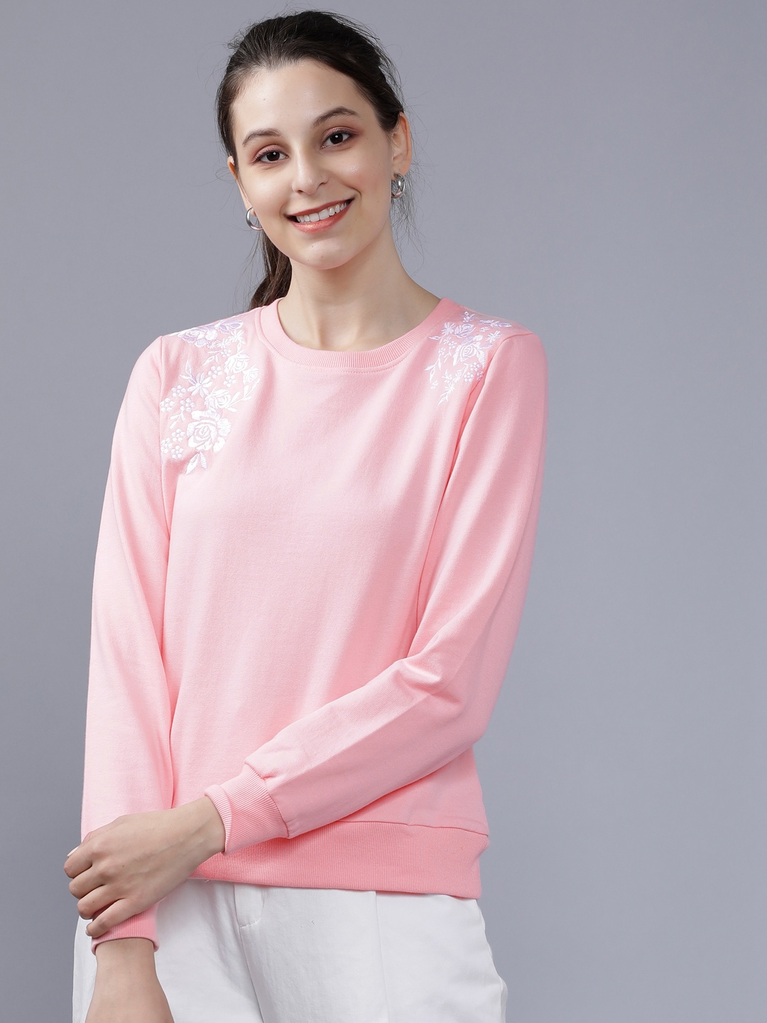

Tokyo Talkies Women Pink Solid Sweatshirt