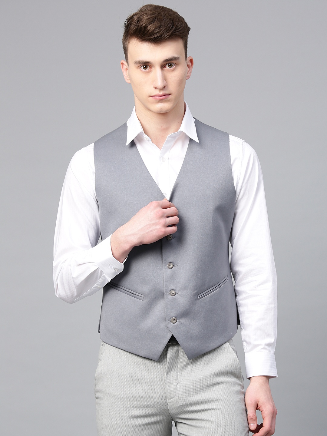 

MANQ Men Grey Solid Slim Fit Single-Breasted Waistcoat