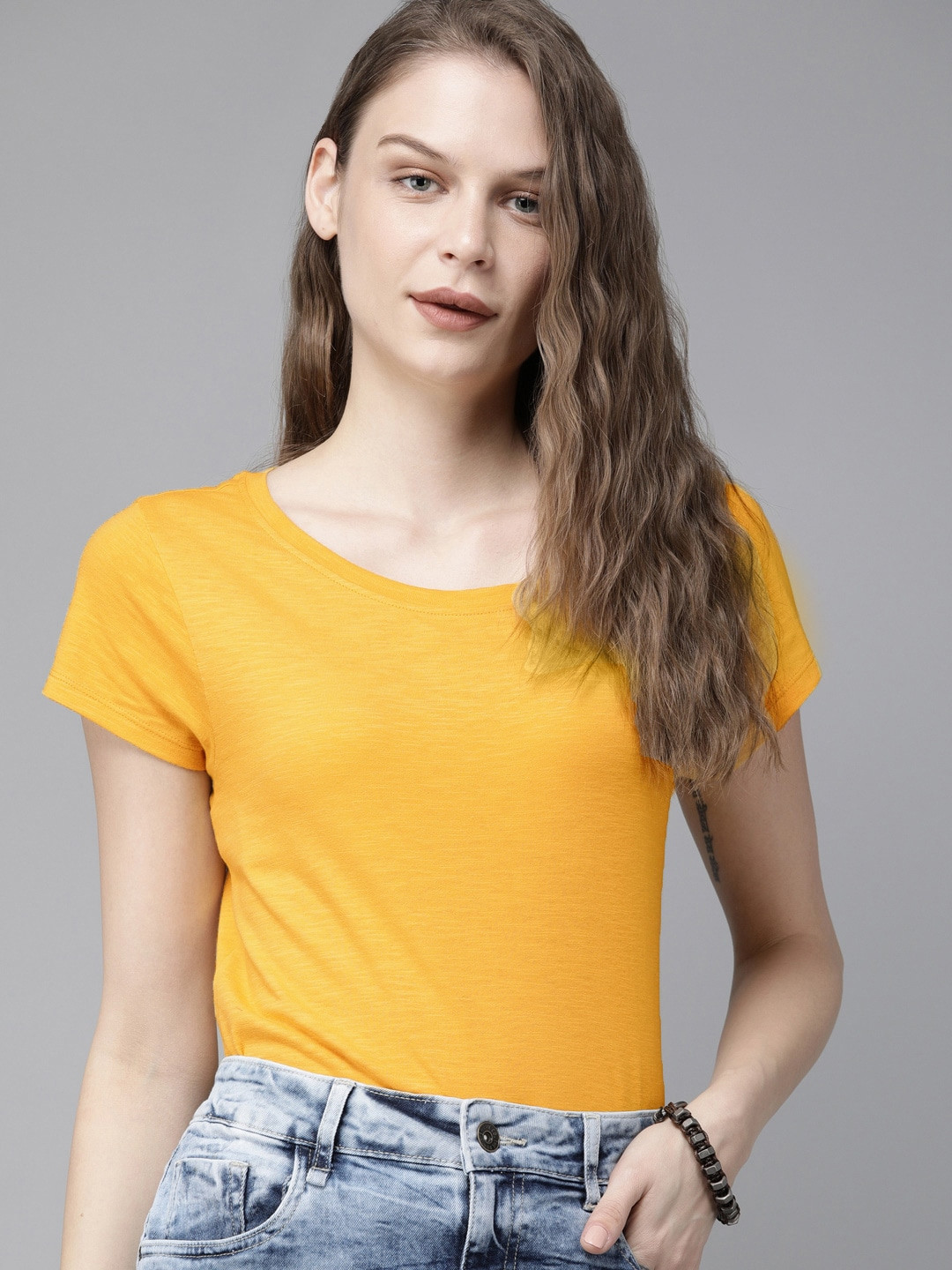 

The Roadster Lifestyle Co Women Mustard Yellow Solid Round Neck Pure Cotton T-shirt