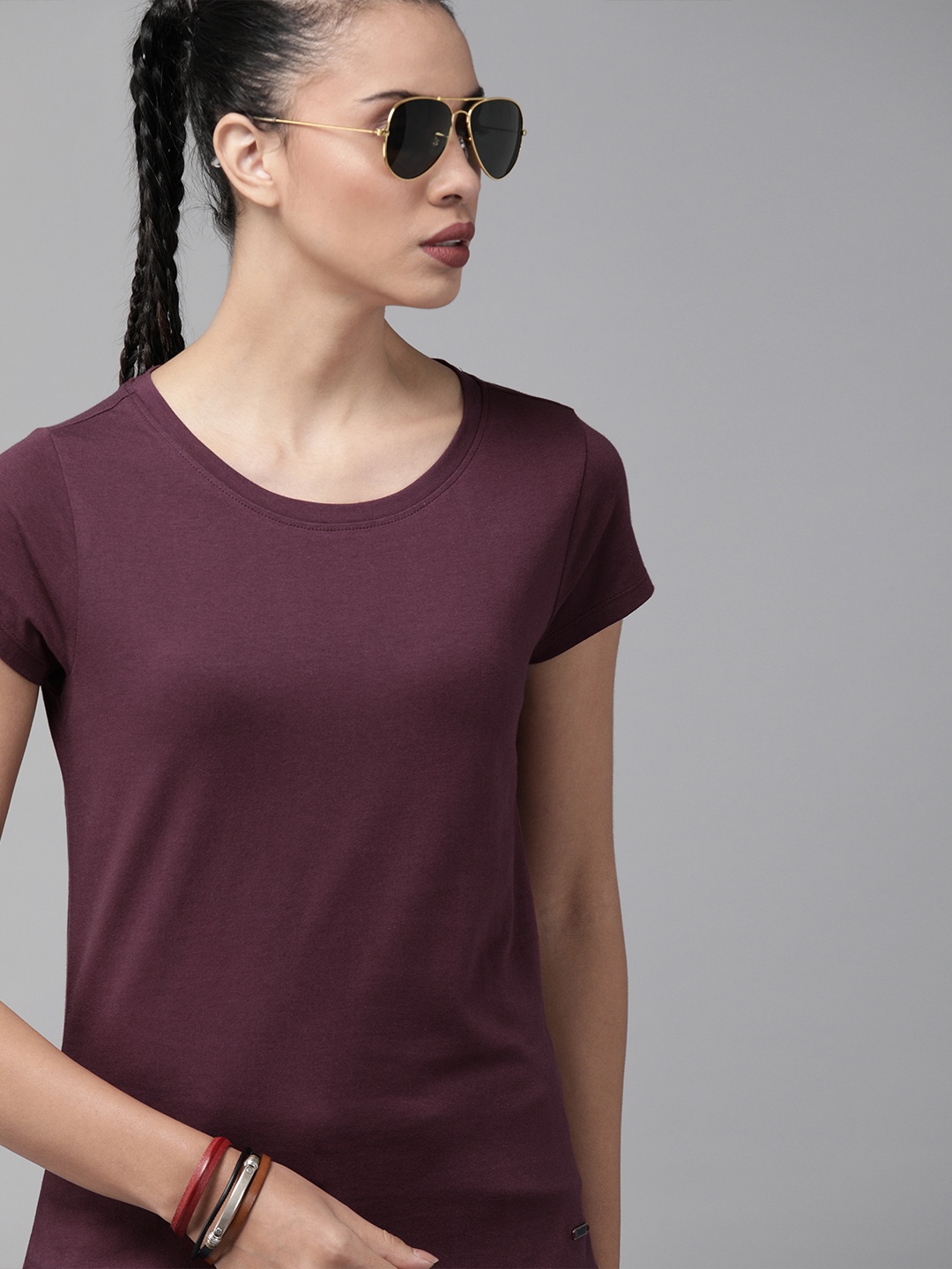 

Roadster Women Burgundy Solid Round Neck T-shirt