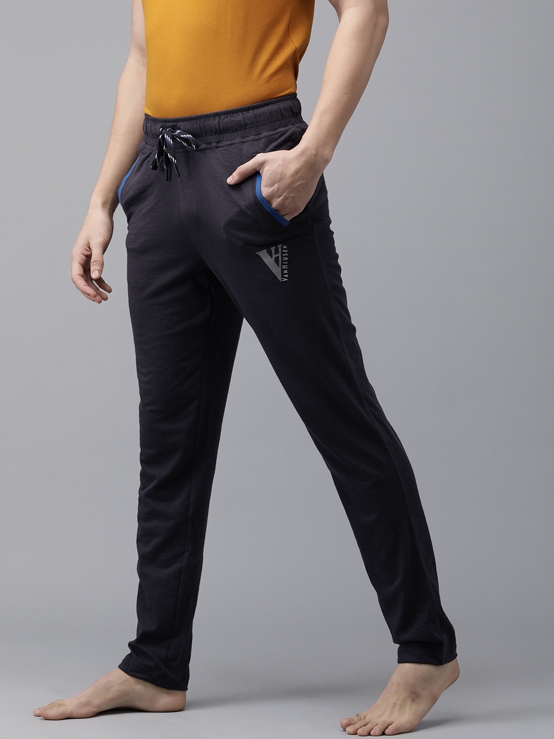 

Van Heusen Athleisure Men Solid Smart Tech Easy Stain Release Track Pants, Charcoal