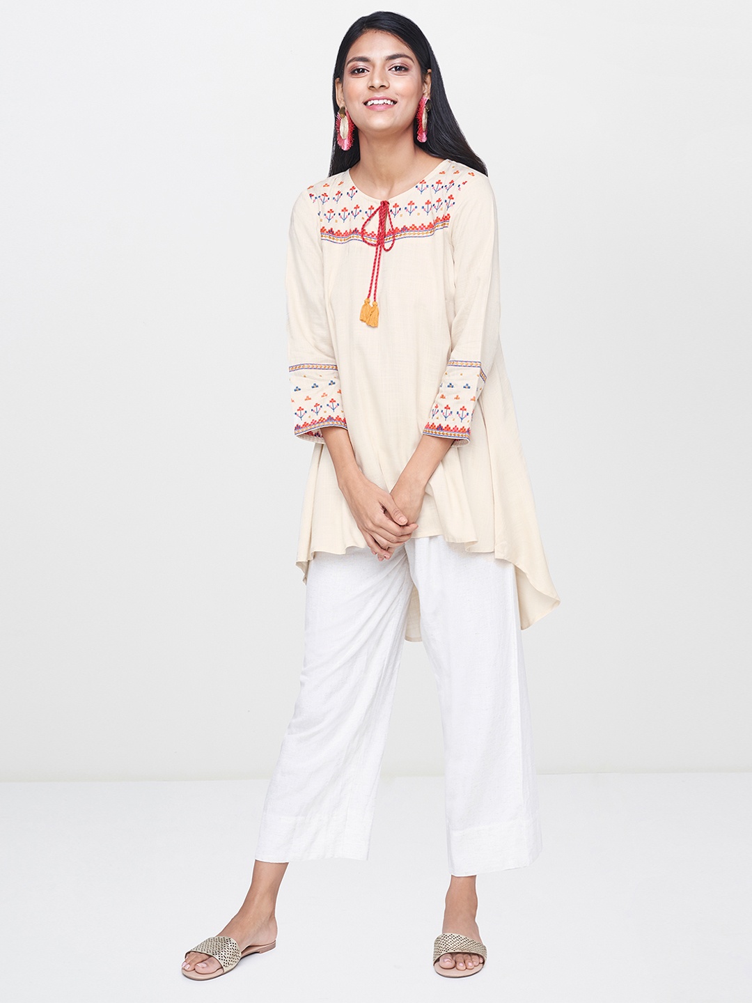 

Global Desi Women Off-White Embroidered Tunic