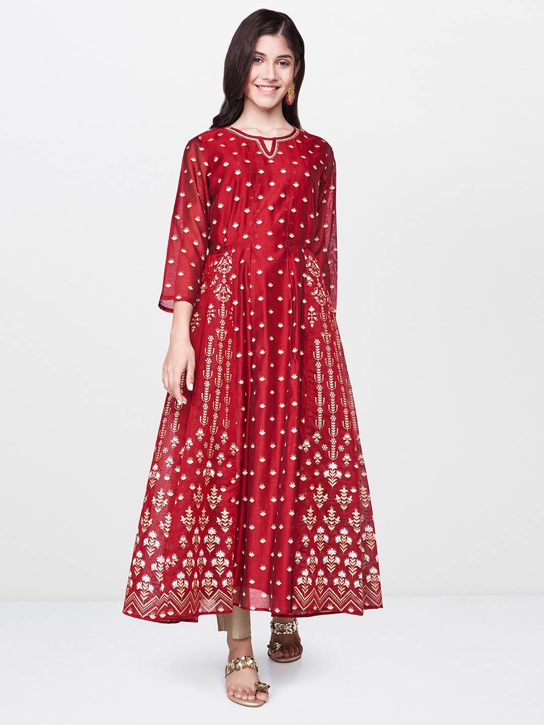 

Global Desi Women Maroon & Golden Printed A-Line Kurta